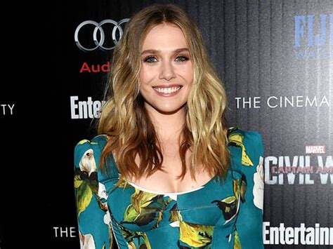 Elizabeth Olsen’s boobs make her uncomfortable on red carpet